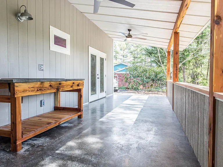 Screen porch, 2 ceiling fans, full sink, grill, and gas heater to extend seasons.