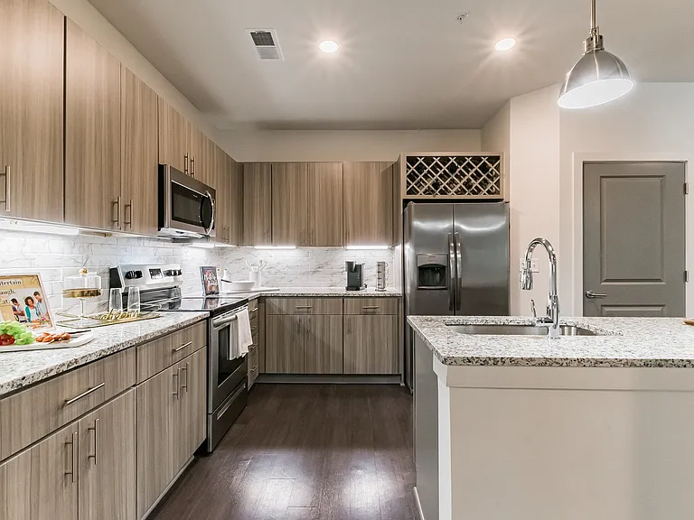 View of Kitchen. Tons of Counter Space, Pantry and Free Standing Island with Sink
