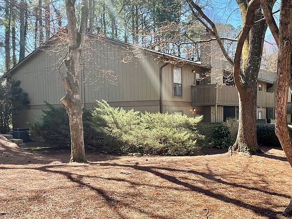 Quiet 1st floor corner unit with lots of green space is conveniently located near the pool and EV charging stations