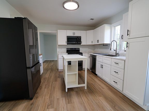 Kitchen with island in center