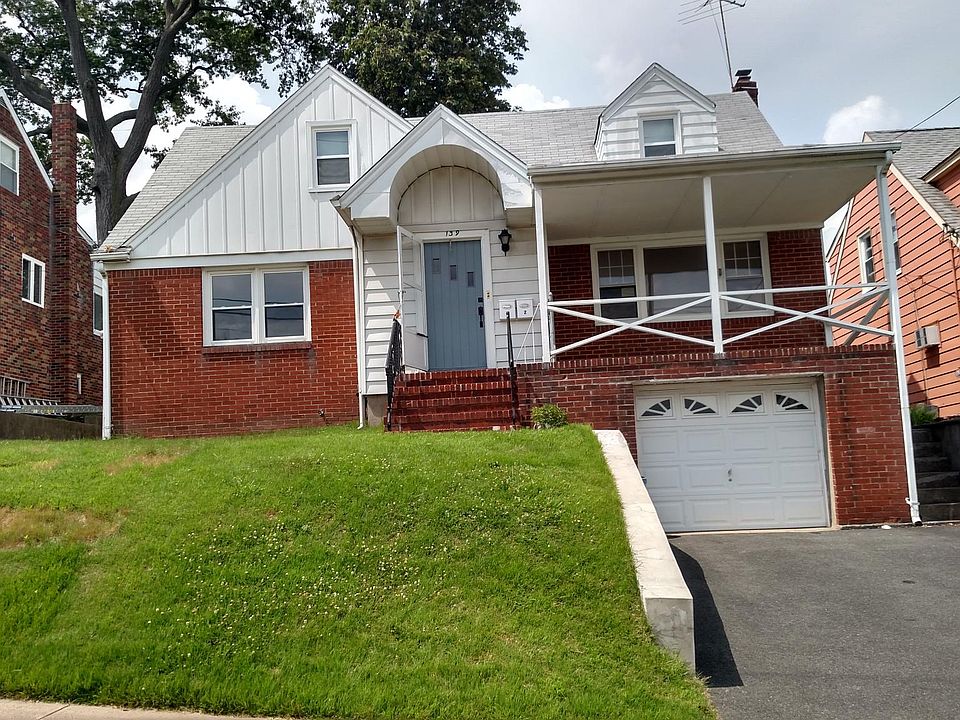 1st floor apartment, garage and porch