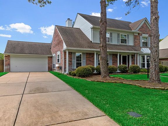 Long double wide driveway provides plenty of parking space