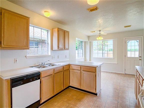 OPEN KITCHEN OPEN TO BREAKFAST AREA