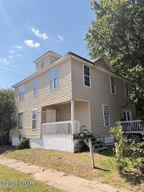 1st image of 409 W 3rd St
