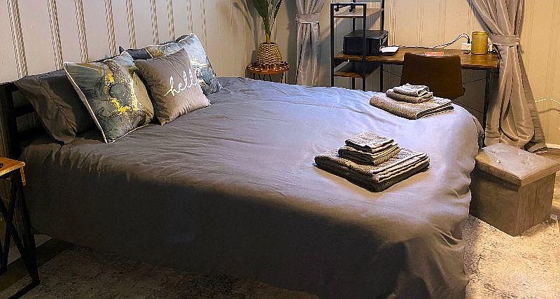 Unwind in comfort with our spacious, fully furnished bedroom featuring a luxurious queen-size bed.