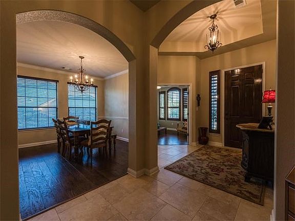 Lots of natural light and hickory wood floors in office and dining room bring a richness to the home.