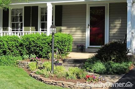 Custom walkway, steps, and dry stone bed