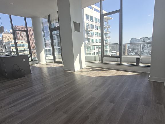 Living/Dining area
Floor to Ceiling Windows 
Exceptional Natural Lighting
Over-Sized Balcony