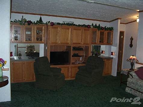 Living room with built-in oak entertainment center