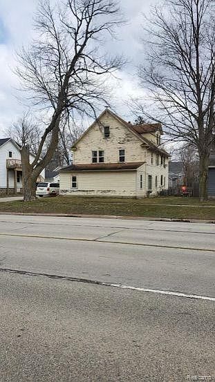 1st image of 409 E Grand River Ave