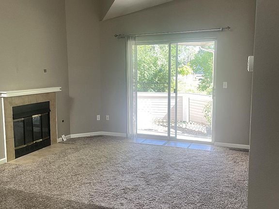 Living Room with Wood Burning Fireplace