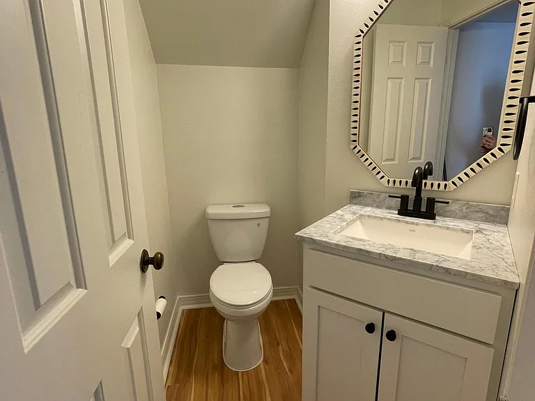 Half bath! New flooring, cabinets, quart countertops with hand picked finishes