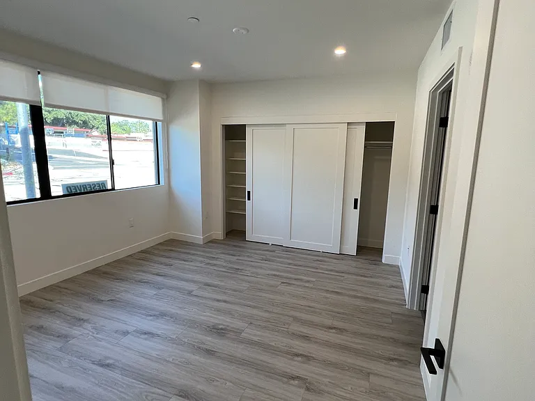 Bedrooms with windows and double closets