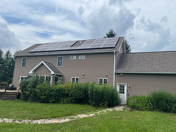 Back of house with solar on roof