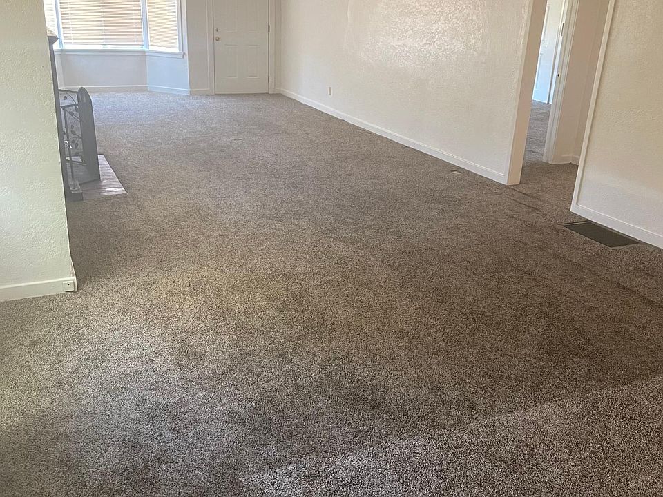 Very large living room with working fireplace