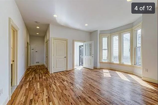 Large, spacious, bright and airy living room with bay windows