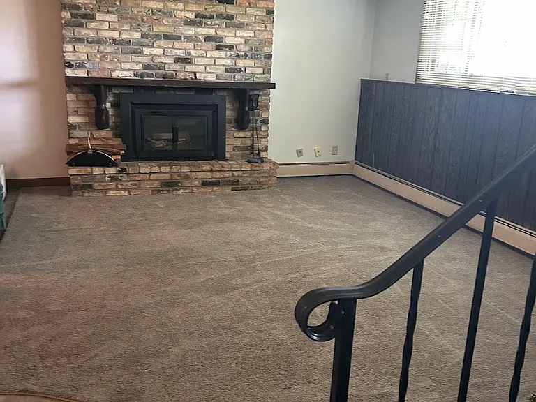 Downstairs living area with fireplace