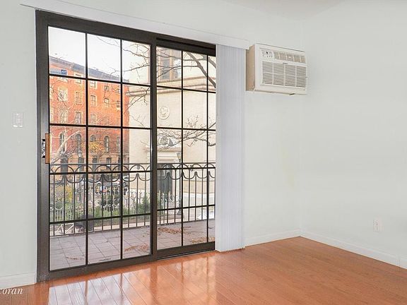 3rd image of 214 E 9th St APT 2A