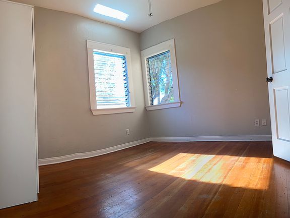 Bedroom with views of downtown, two closets and a ceiling fan!