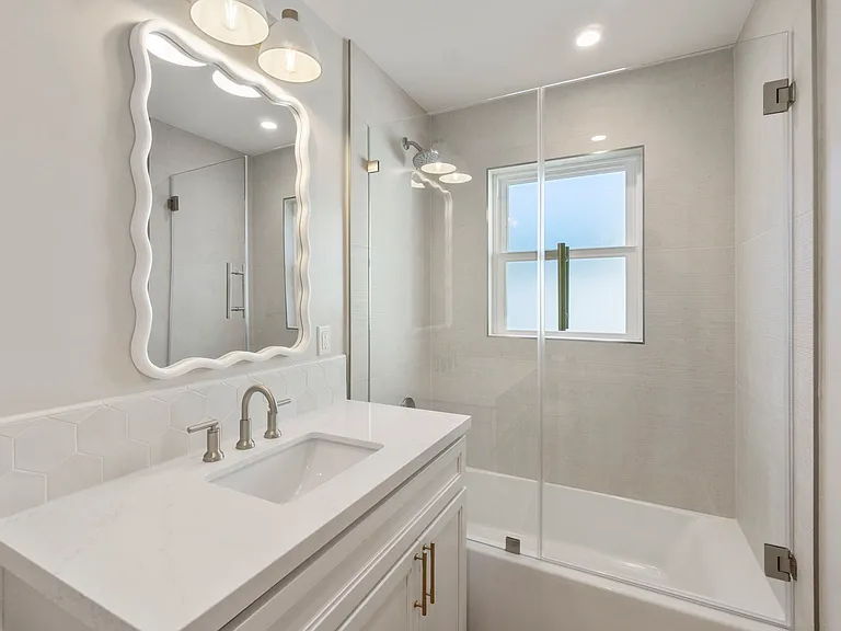 Guest bath with new high-end finishes and designer accents