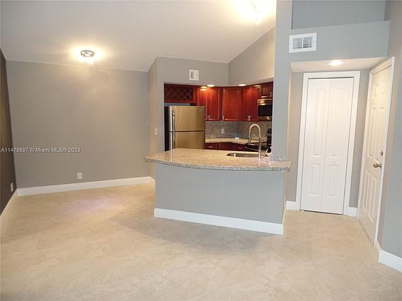 3rd image of 3440 Pinewalk Dr N APT 513