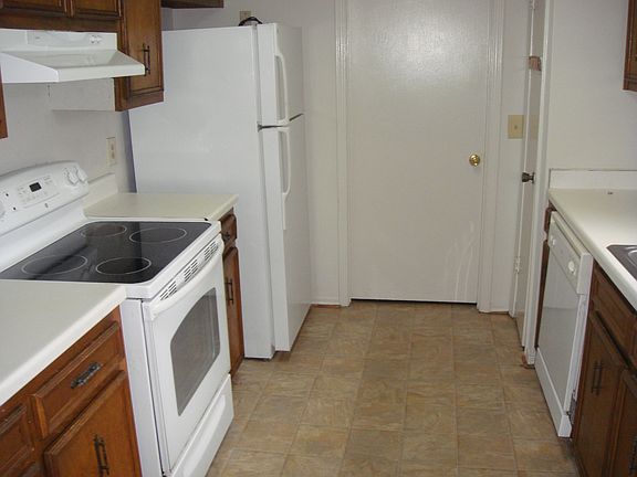 Kitchen with modern appliances - icemaker refrigerator