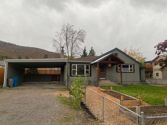 View from Talent Ave. Garden beds are ready with drip-system pre-installed. Front yard is enclosed.