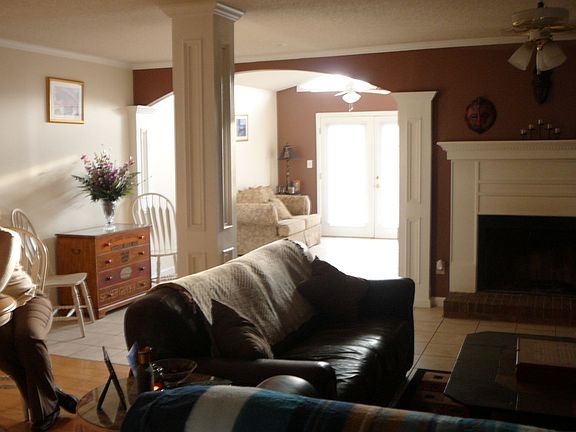 Cozy Family Room with Fireplace/Hidden Bar