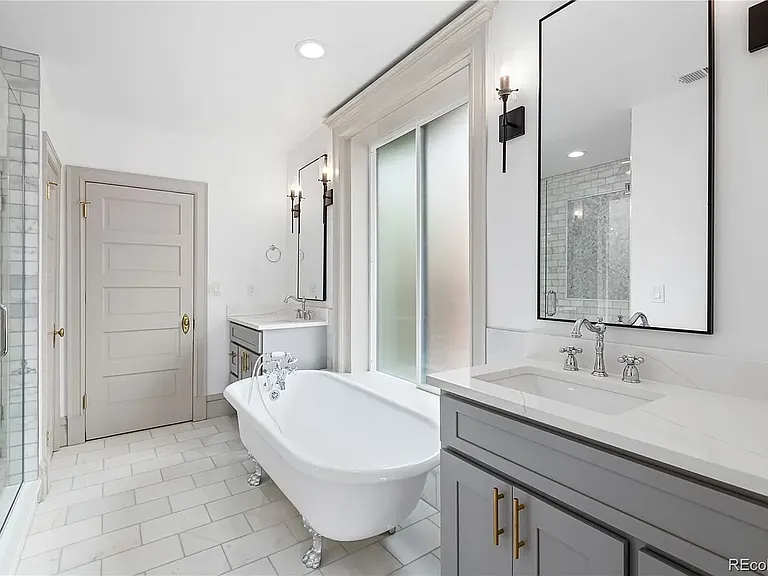 Primary bath (door shown has been replaced with sauna door)