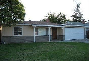 Beautifully landscaped on large lot!
