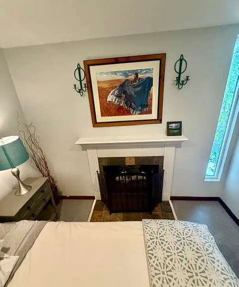 Primary Bedroom Gas Fireplace.