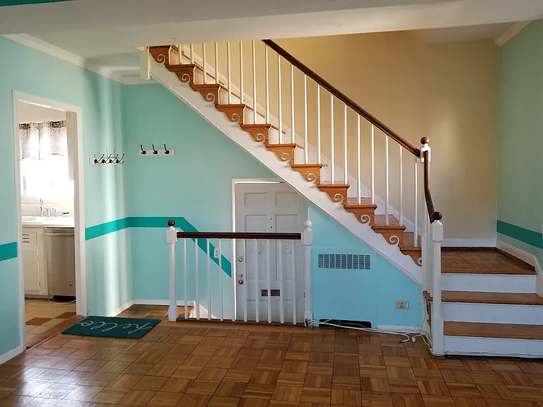 Entryway -- note that the current paint color is more neutral beige