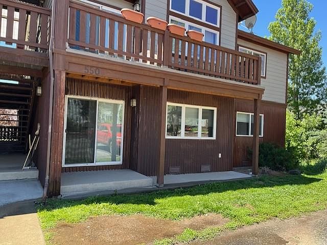 front of unit showing sliding glass door into the dining room area