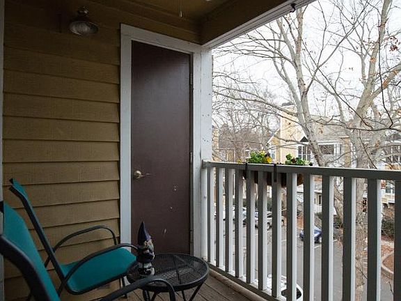 Simple porch with seating for two.