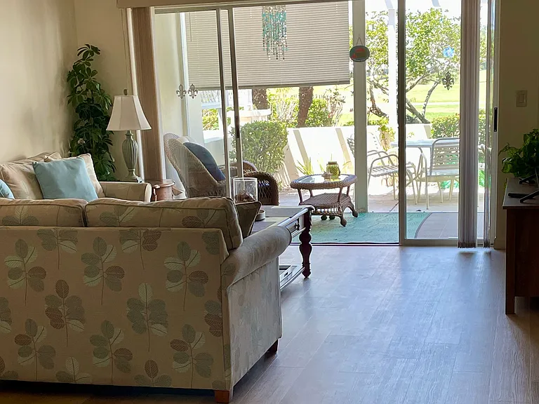 Living Area looking out to Lanai (New Wood Look Vinyl Flooring)