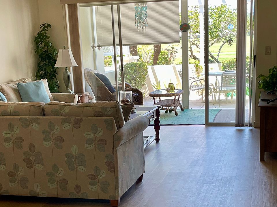 Living Area looking out to Lanai (New Wood Look Vinyl Flooring)