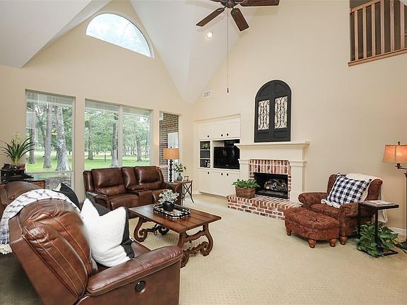 Family room with Vaulted ceiling plus large picture windows overlooking Golf Course