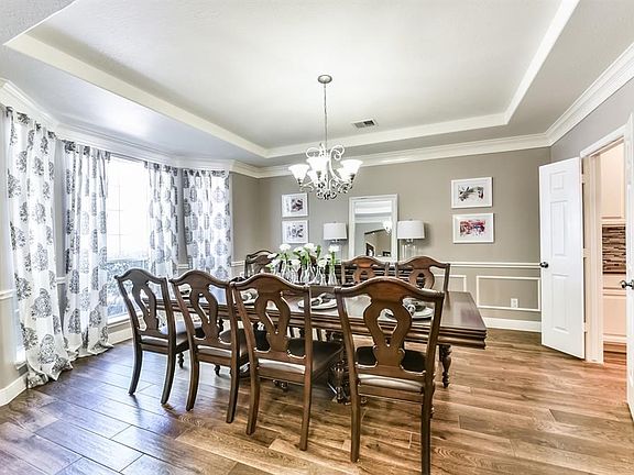 The large dining room sits at the front of the home with instant access to the kitchen!
