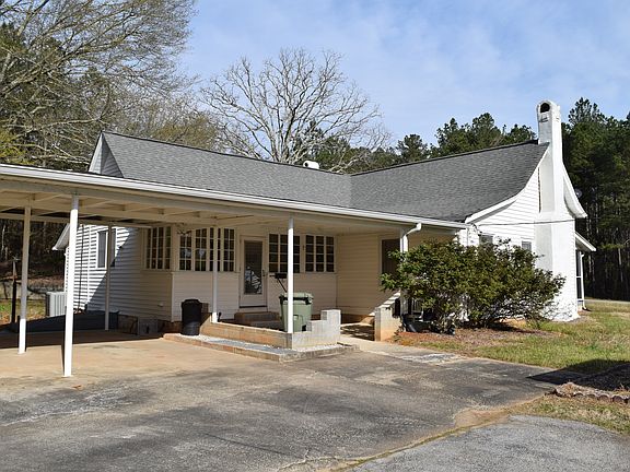 Backdoor entrance by carport