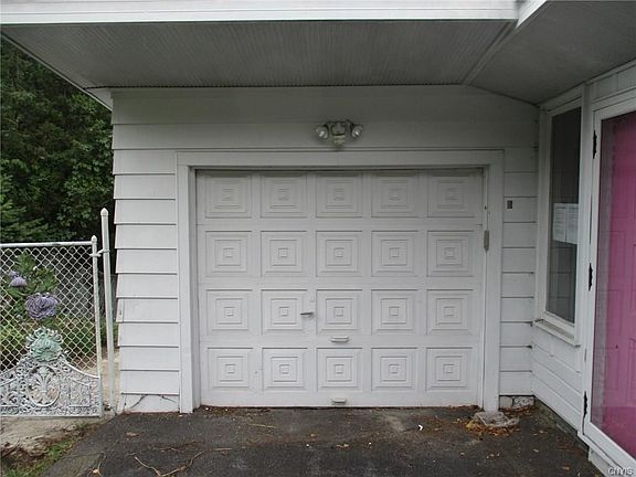 Attached one car garage belongs to the two bedroom apartment.
