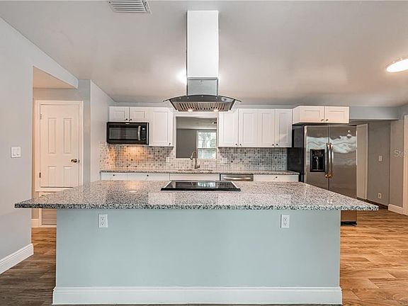 5th image of 9306 N Willow Ave