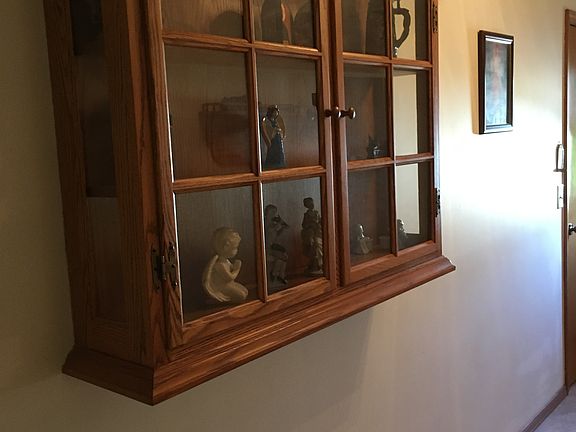 Curio cabinet in foyer