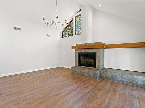 Living Room with Wood Burning Fireplace