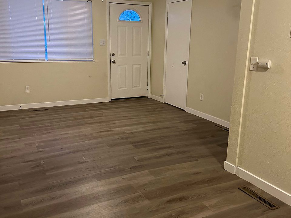 Living area. Storage door on the right.