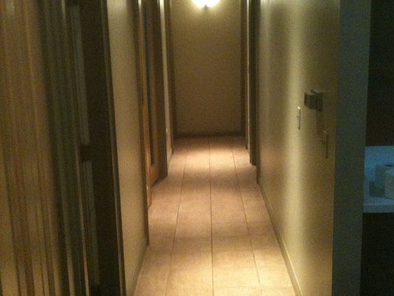 Hallway, tiled floor.