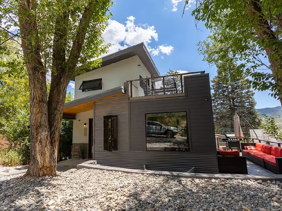 Exterior with side deck and outdoor furniture