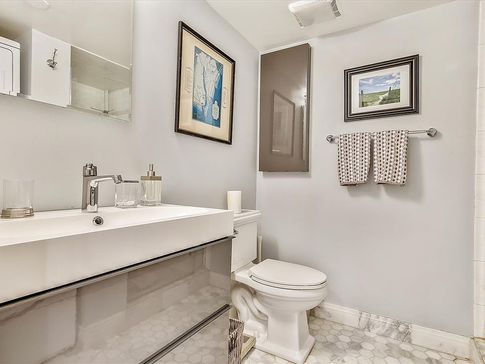 Full bath with shower and washer/dryer