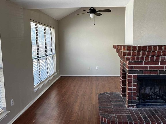 Looking from Living Room, past the fireplace we can see the Dining Room are.