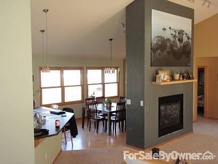 Family Room #3
						:
						A view from the family room into the dining room.