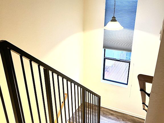 Ample storage located underneath stairs and all living spaces are located on second floor.